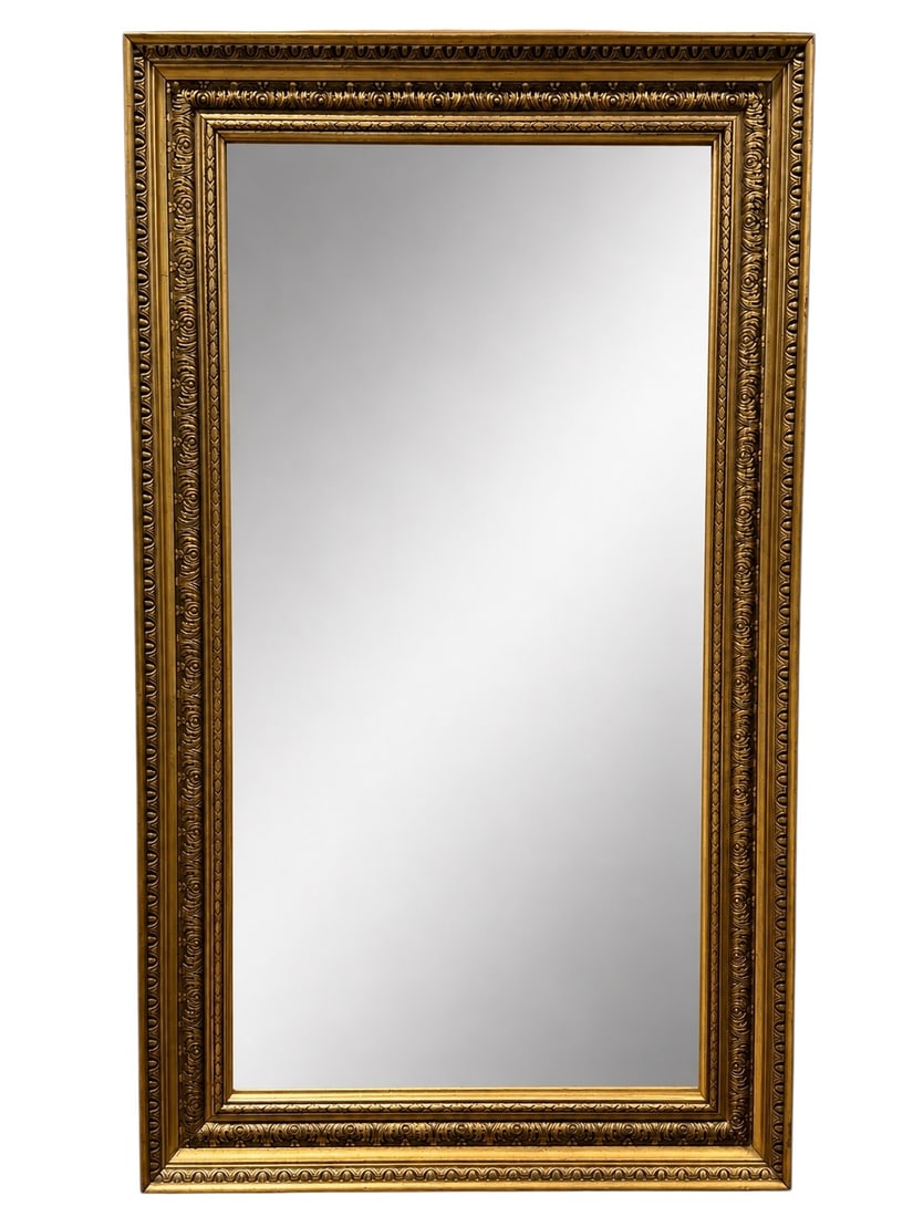 Vintage Classical Revival Gilt Finished Rectangular Wall Mirror: Tall rectangular wall mirror set within a richly molded gilt-finished frame incorporating multiple concentric decorative borders, including repeating egg-and-dart, stylized foliate, scroll and geometr