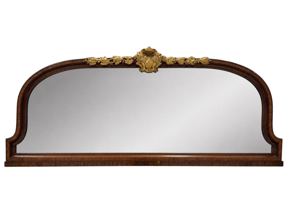 French Louis XV Revival Walnut and Gilt-Bronze Overmantel Mirror, Late 19th Century: Elegant late 19th-century French Louis XV Revival overmantel mirror, constructed in richly figured walnut with decorative banded and contrasting veneer work following the shaped arched outline of the 