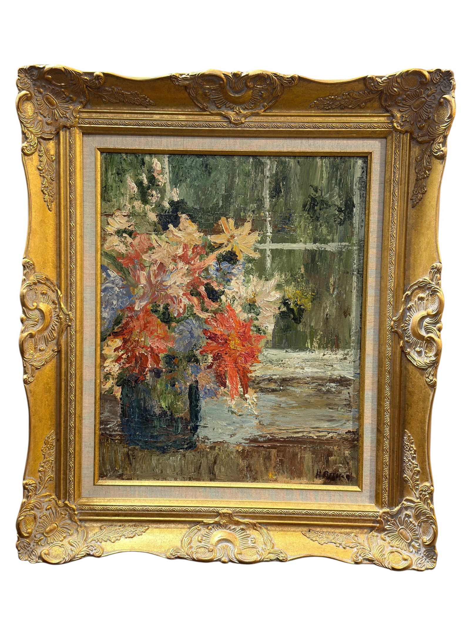 Artist Signed Impressionist Floral Still Life, Oil on Canvas: Charming artist-signed floral still life executed in oil on canvas, depicting a lush bouquet of garden flowers arranged in a dark blue-green vase before a softly rendered interior or window setting. T