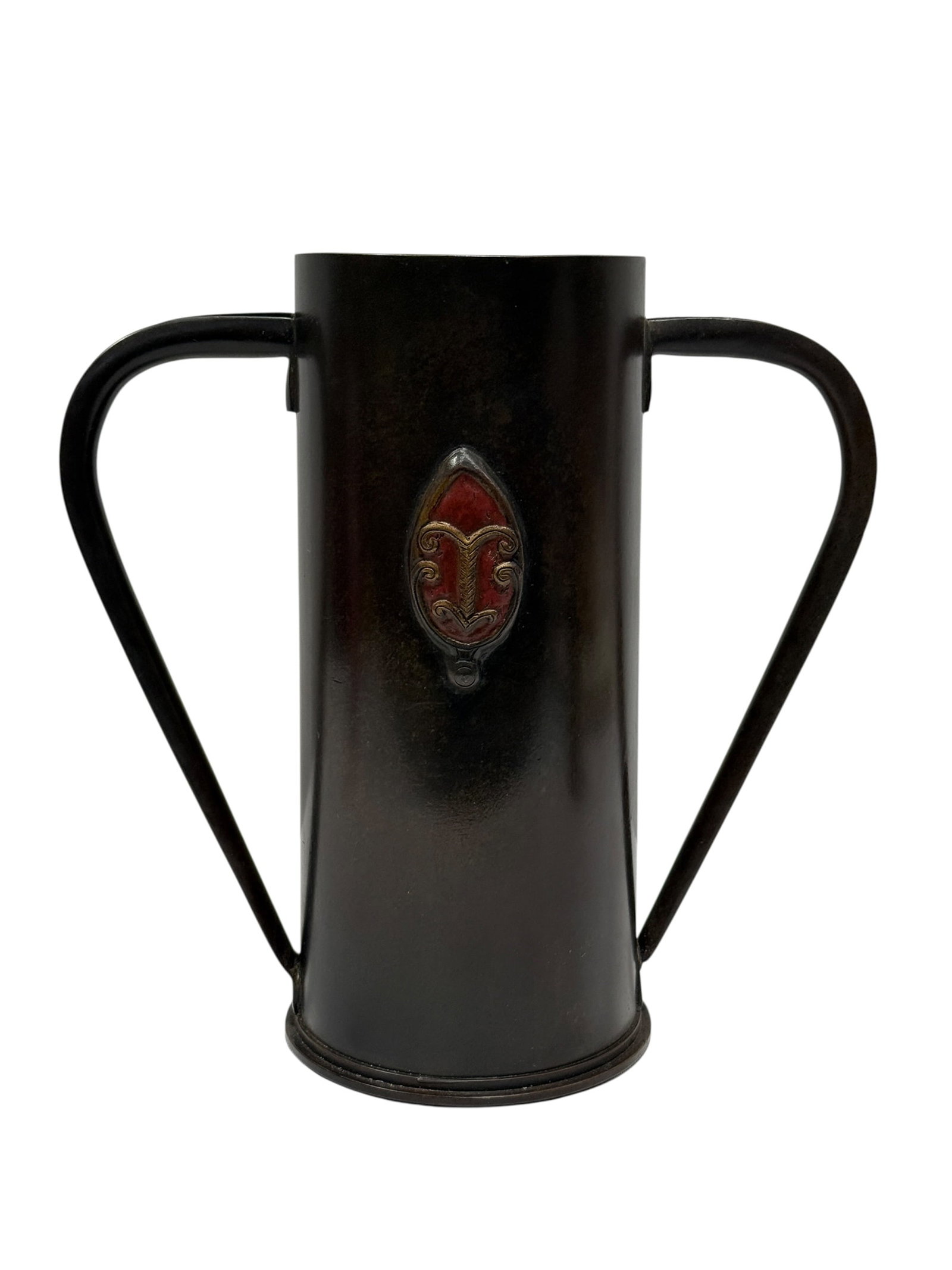Dirk van Erp Style Arts & Crafts Artillery Shell Vase: This decorative vessel is a notable example of a repurposed artillery shell, often referred to as "trench art," which has been refined in the Arts & Crafts tradition. The vase features a clean, cylind