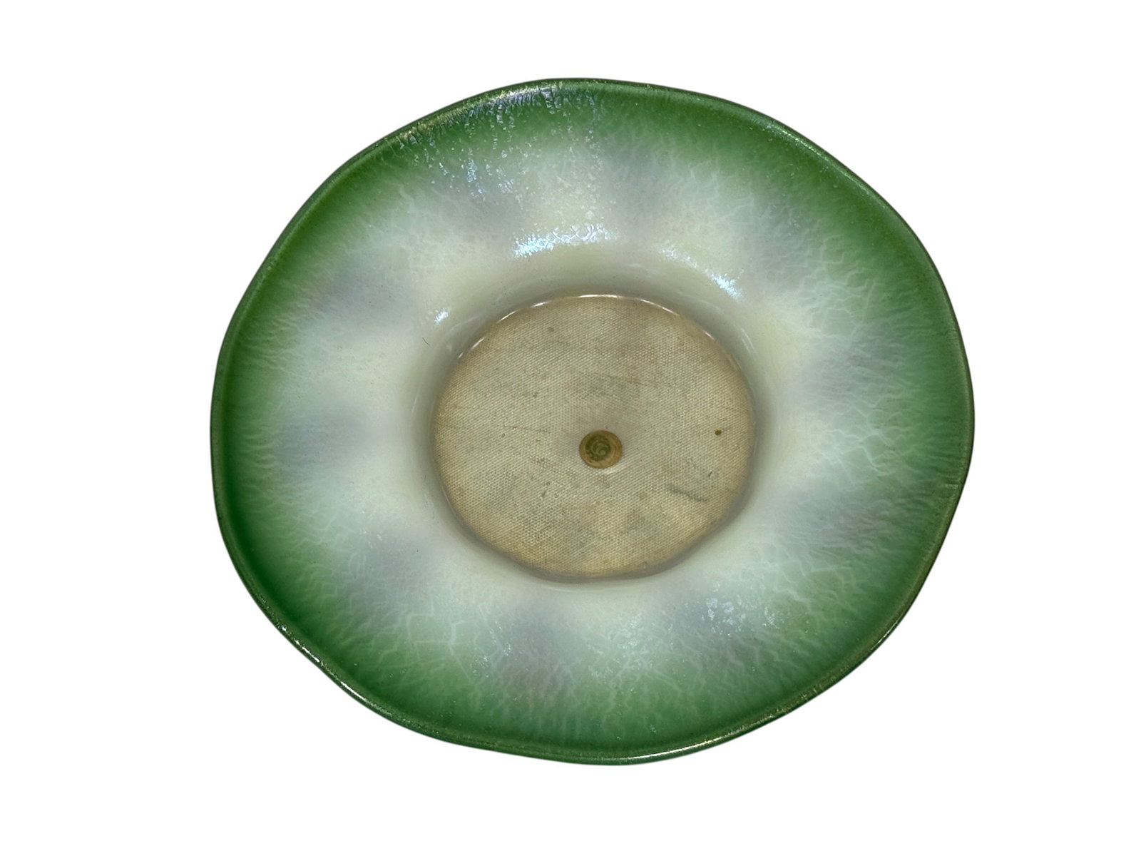 Tiffany Studios Favrile Pastel Green Opalescent Glass Plate, Early 20th Century: Early 20th-century Tiffany Studios Favrile art glass plate of broad, shallow circular form, displaying a delicate pastel color scheme with a luminous opalescent white center gradually shading to soft 