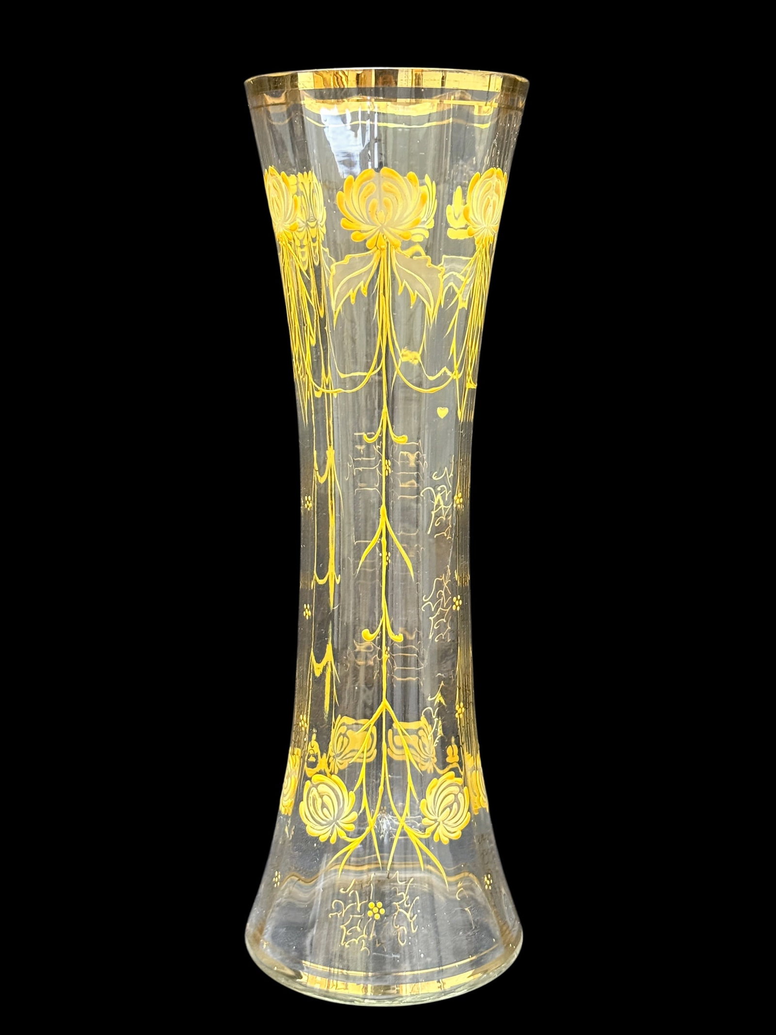 French Art Nouveau Gilt & Enameled Chrysanthemum Glass Vase, Circa 1900: Tall French Art Nouveau blown glass vase, circa 1900, of elegant elongated trumpet form with a gently spreading base, subtly paneled sides, and broad flaring mouth. The clear glass body is richly hand