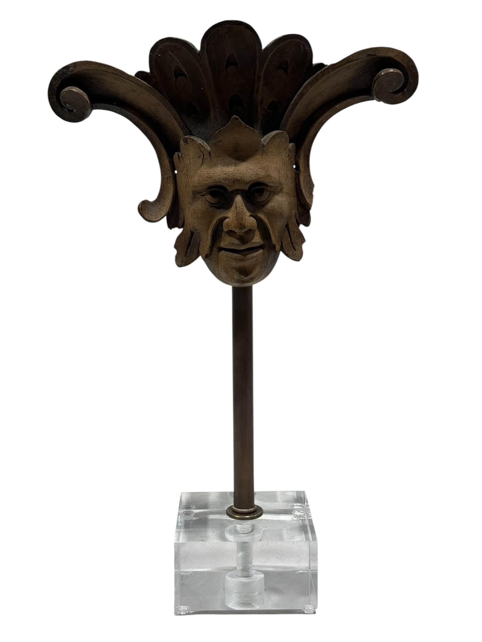 19th Century Carved Wood Grotesque Satyr Mask Architectural Ornament on Lucite Stand: Distinctive 19th-century carved wood architectural ornament centered by a boldly modeled grotesque or satyr-like masculine mask beneath an exuberant crest of stylized foliage and large outward-scrolli