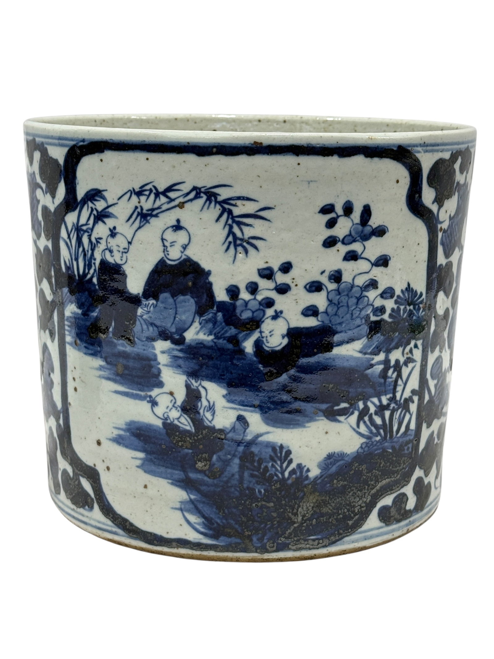 1900s Chinese Blue and White Porcelain Jardiniere: Large Chinese blue and white porcelain jardiniere of cylindrical form, decorated in underglaze cobalt blue with a lively continuous figural garden scene featuring numerous children among flowering pla