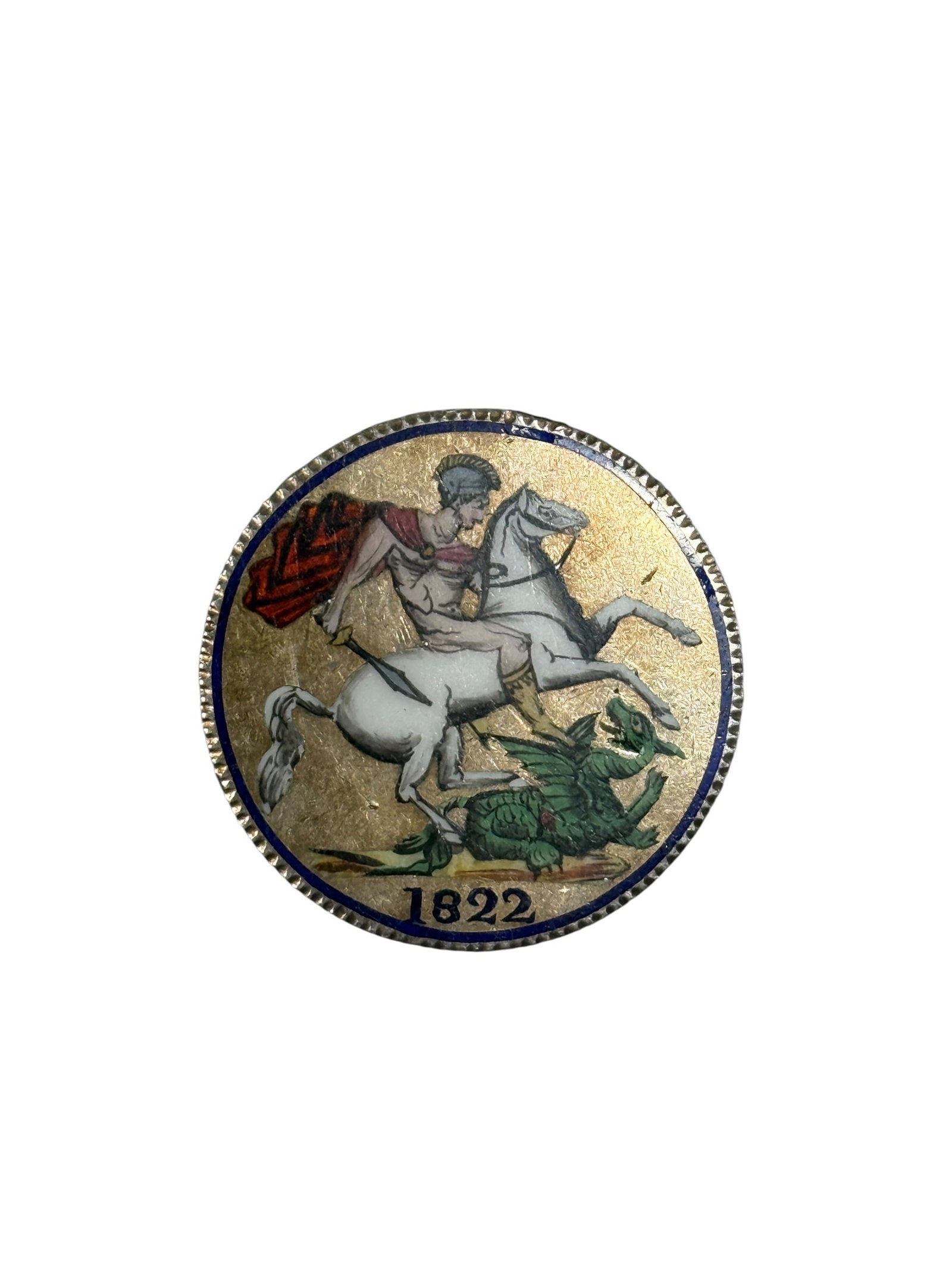 1822 George IV Silver Crown Enamel St. George and Dragon Brooch: Striking antique brooch fashioned from an authentic 1822 British George IV silver crown, the reverse dramatically enhanced with polychrome enamel decoration depicting Benedetto Pistrucci’s celebrate