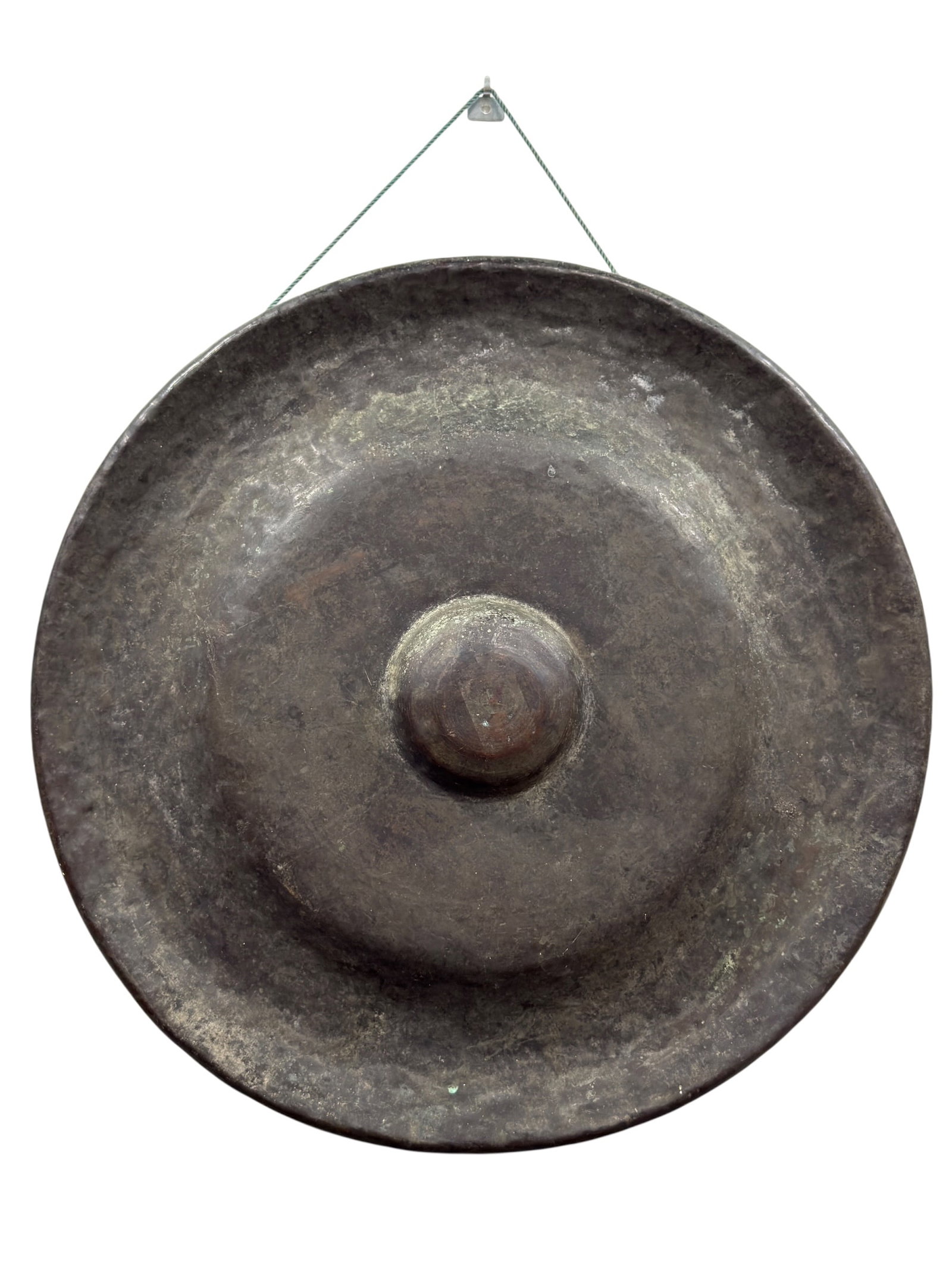 Large Southeast Asian Bronze Bossed Gong, 20th Century: Large Southeast Asian bronze gong of traditional circular form, cast with a broad slightly turned rim and a prominent raised central boss or nipple, the entire surface retaining a richly mottled dark 