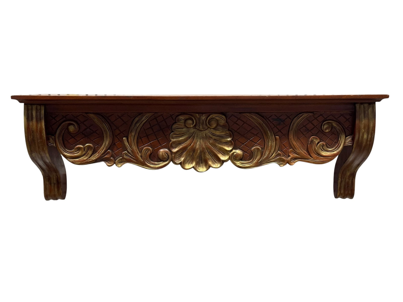 Traditional Carved Wood Wall Console Shelf with Gilt Accents: Decorative traditional-style wall-mounted console shelf crafted in richly finished wood, featuring a shaped rectangular top supported by bold scrolled brackets and an elaborate carved apron. The front