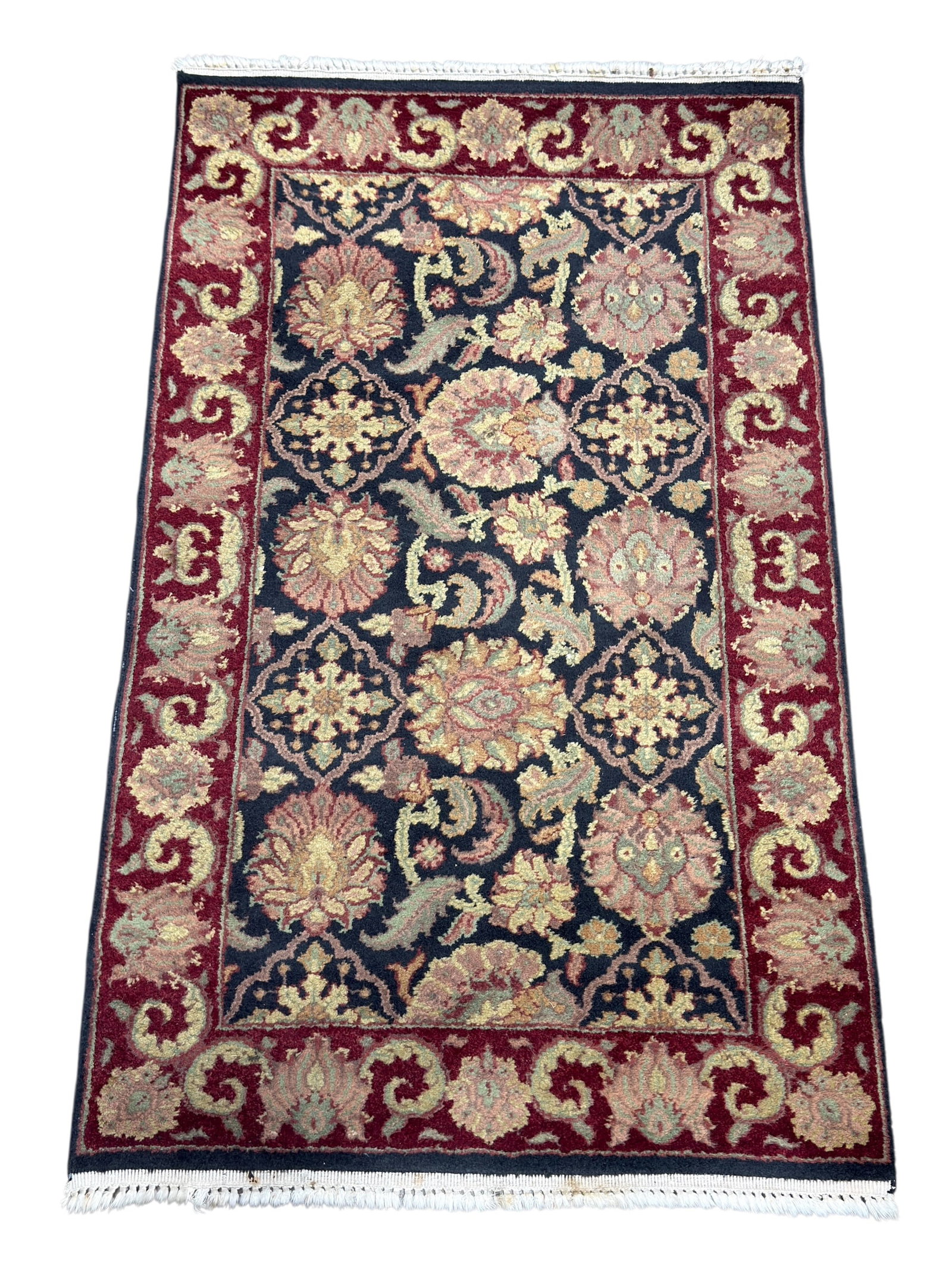 Vintage Hand-Knotted Floral Wool Accent Rug w/ Black Field and Red Border: Decorative vintage hand-knotted wool accent rug featuring a dense allover floral design worked across a deep black field in muted shades of cream, rose, sage, tan, and soft green. The central field is