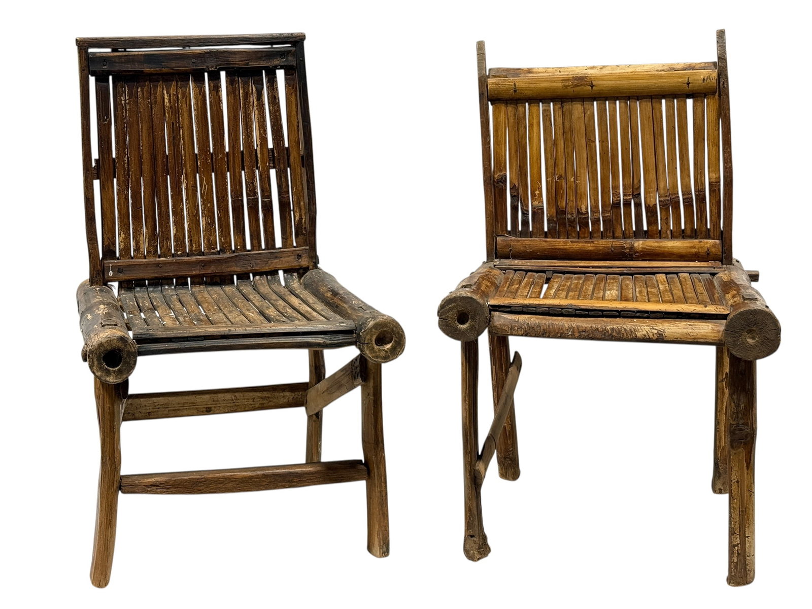 Pair of Child's Bamboo Slat Chairs: A pair of child-sized rustic chairs constructed primarily from split and whole bamboo poles. Each chair features a rectangular backrest and seat comprised of closely set vertical and horizontal bamboo