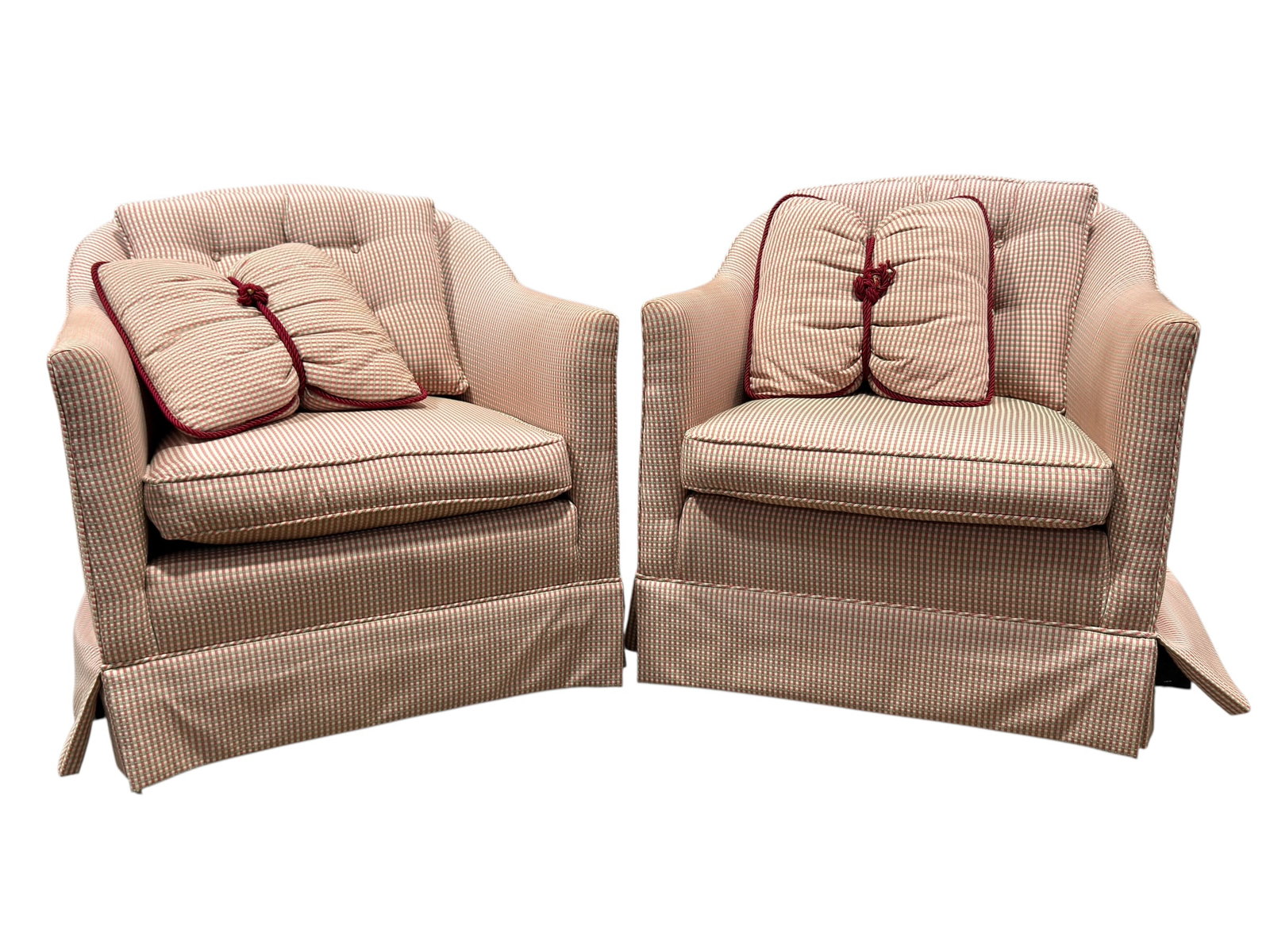 Pair of Custom Upholstered Barrel-Back Club Chairs: Pair of generously proportioned custom upholstered club or lounge chairs, each designed with a rounded barrel-form back flowing into broad upholstered arms, a loose rectangular seat cushion, and tailo