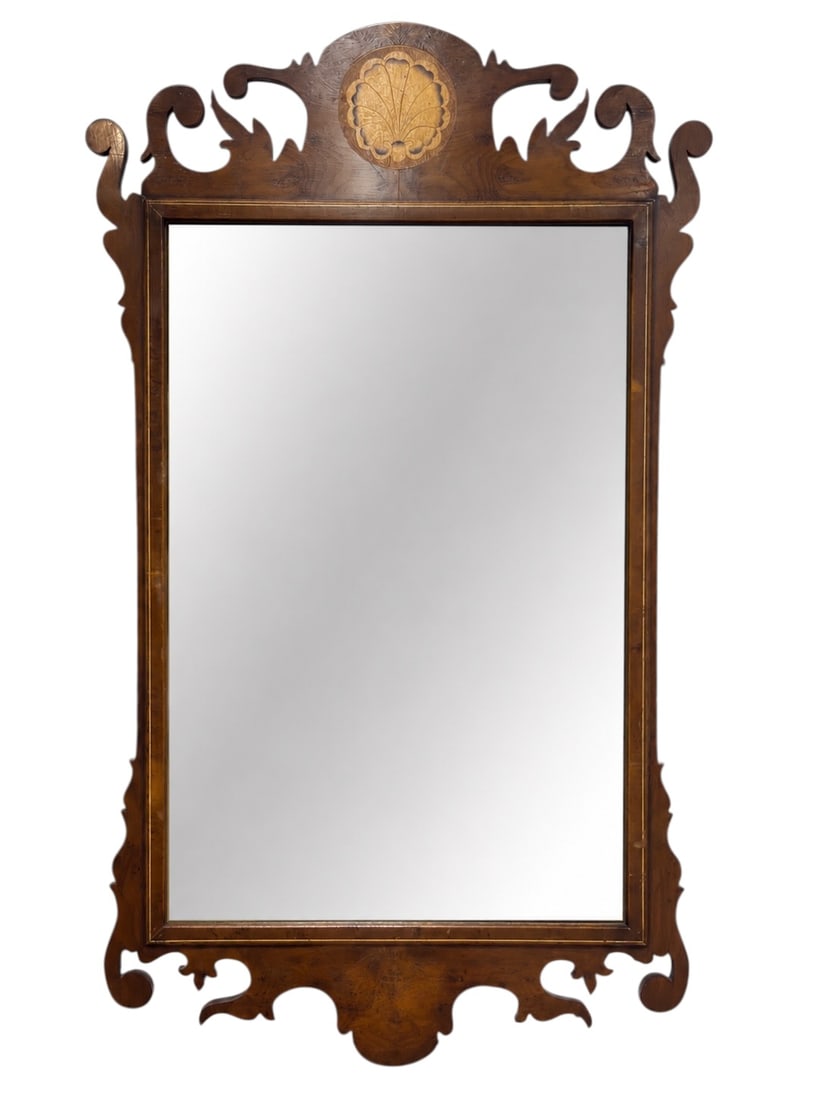 Georgian Chippendale Style Mahogany Wall Mirror: Elegant Georgian Revival wall mirror in the Chippendale taste, constructed with a warm mahogany-toned frame surrounding a rectangular mirror plate and enriched with delicate line inlay. The frame is d