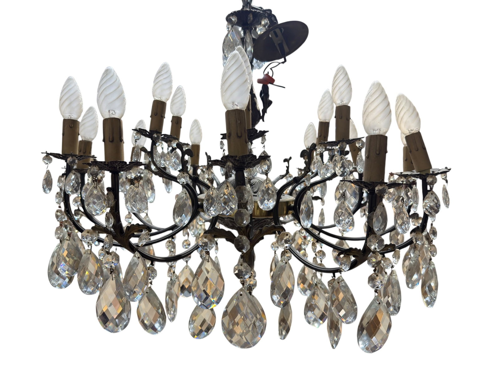 Vinntage French Louis XV Style Bronze Tone & Crystal Chandelier: Impressive vintage French Louis XV style chandelier featuring a dark bronze-tone metal frame with numerous gracefully scrolling candle arms arranged in multiple tiers, each fitted with foliate bobeche