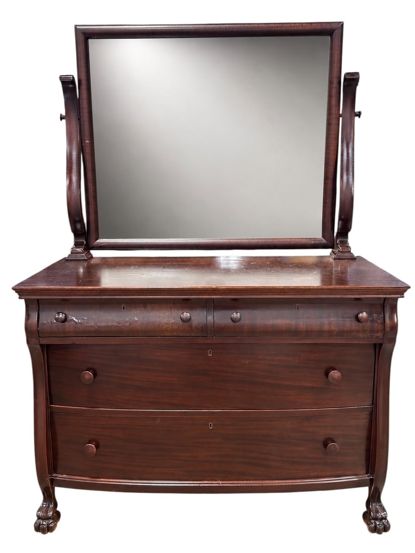 19th C. American Classical Mahogany Dressing Chest w/ Mirror: Handsome American Classical mahogany dressing chest, circa mid-19th century, surmounted by a large rectangular tilting mirror held between gracefully shaped upright supports with turned adjustment kno