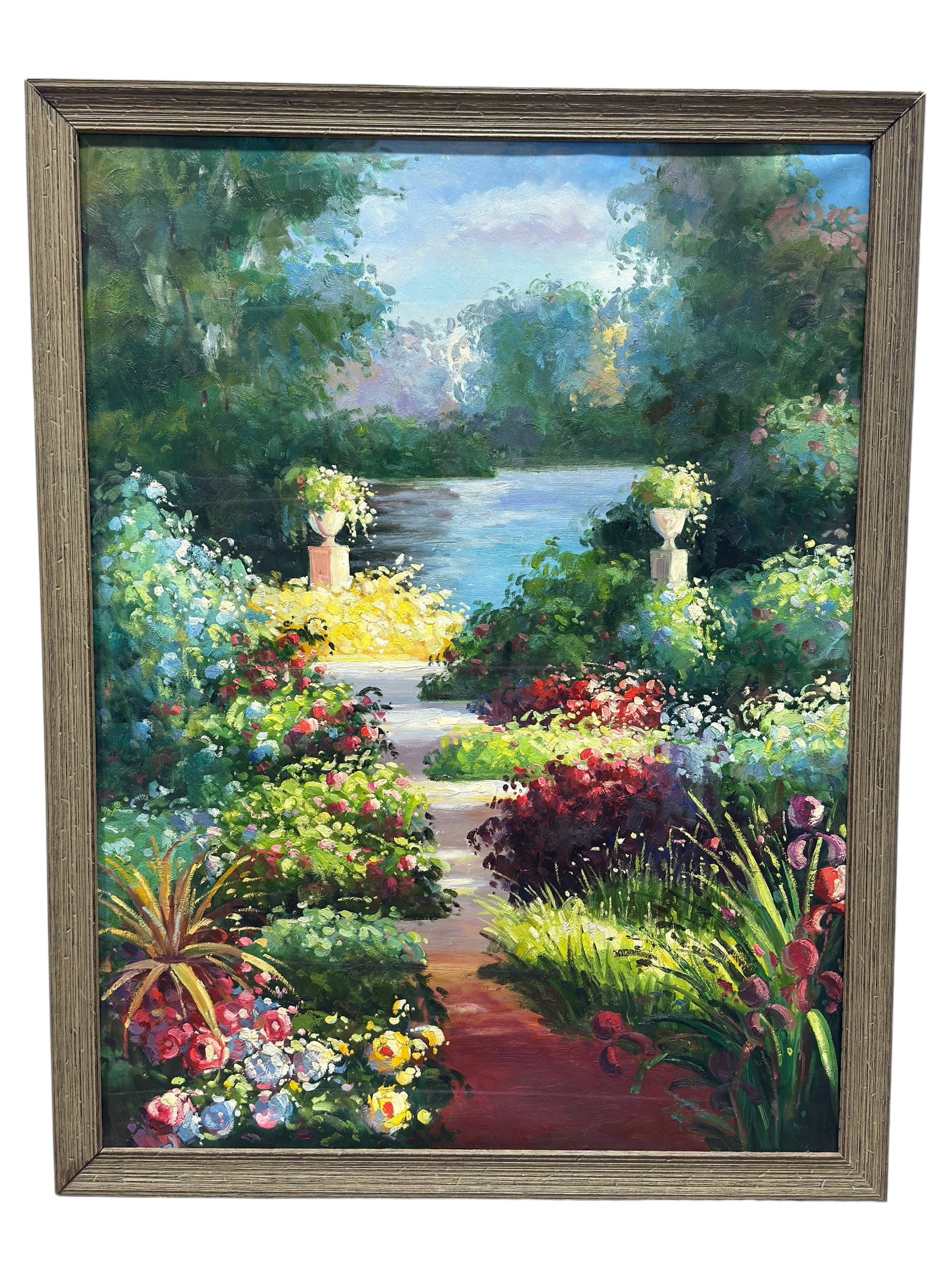 Large Impressionist Garden Landscape Oil on Canvas: Large oil on canvas garden landscape depicting a richly planted formal garden opening toward a calm body of water in the distance. A winding path leads through dense beds of colorful flowers and folia