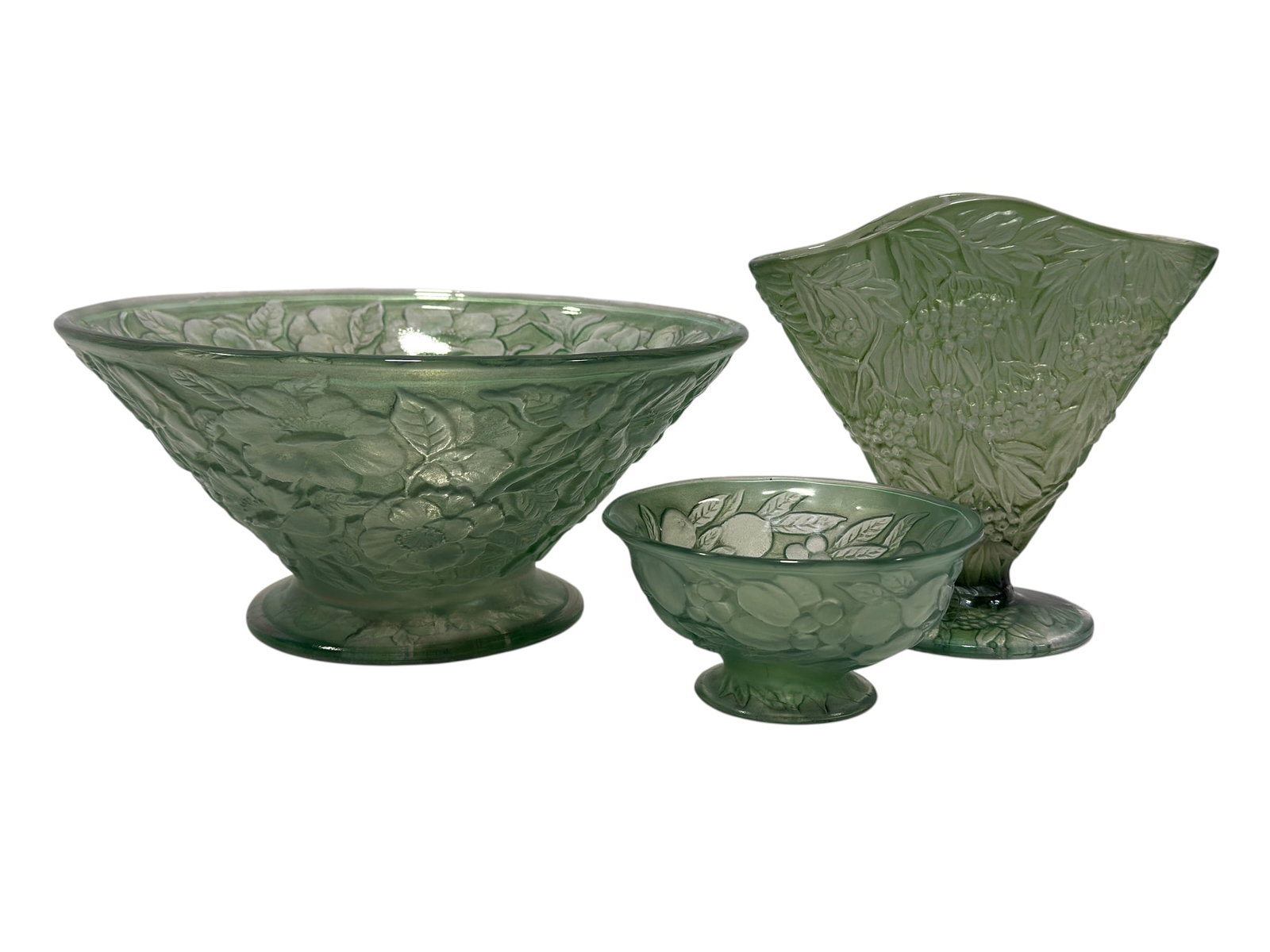Pheonix Consolidated Martele Line Green Pressed Glass Bowls & Vase: (2) 1930s Martele line bowls, comprising a large footed serving bowl and a smaller matching bowl in translucent pale green pressed glass. Both pieces are richly molded in relief, the larger bowl displ