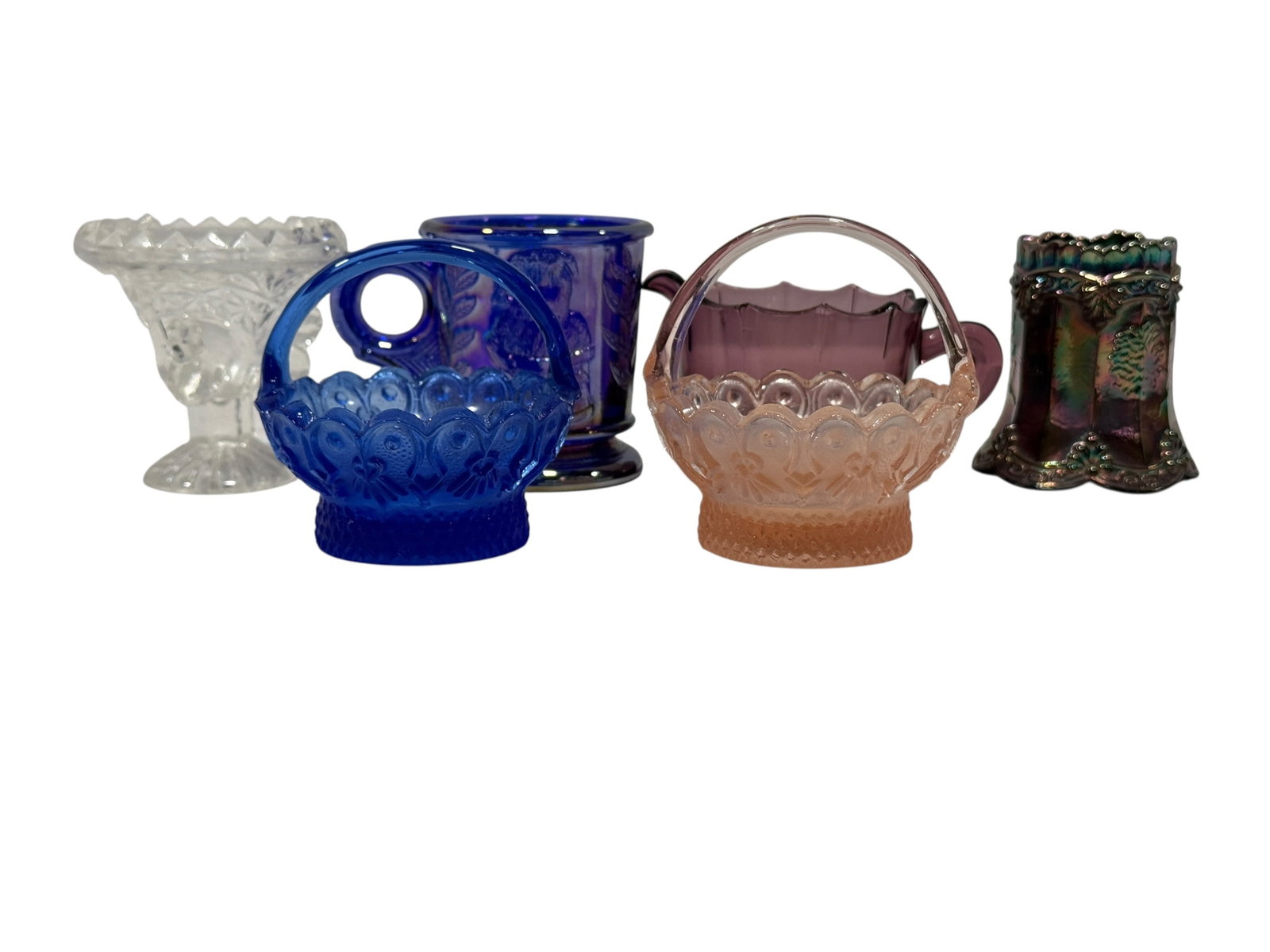 (6) Small Vintage Art Glass & Pressed Glass Decorative Pieces: A colorful six-piece assortment of vintage decorative glass featuring a variety of forms, colors, and molded patterns. The group includes a deep amethyst handled creamer with scalloped rim and starbur