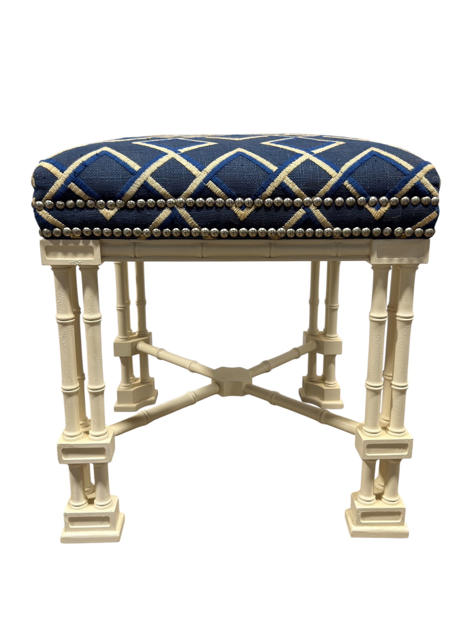 Chinese Chippendale Style Faux Bamboo Upholstered Stool: A stylish decorative stool featuring a Chinese Chippendale Style faux bamboo frame with clustered column-form legs, geometric corner blocks, and crossed stretcher supports centered by a shaped hub. Th