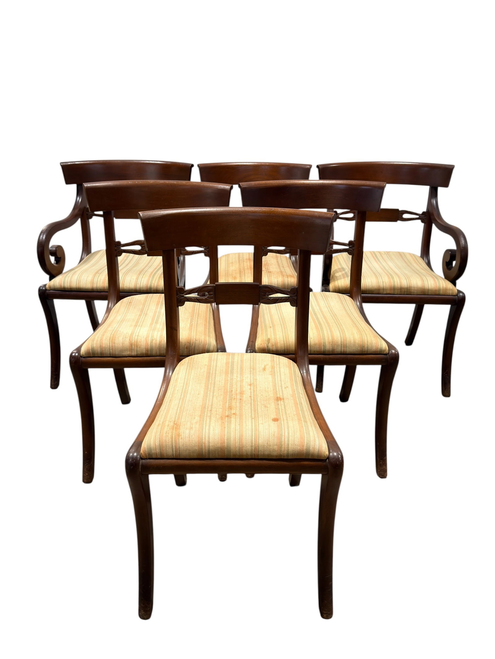 Set of 6 Mahogany Dining Chairs: Set of six traditional mahogany dining chairs comprising two armchairs and four armless side chairs, each with a broad curved crest rail, upholstered striped seat, and shaped front legs. The