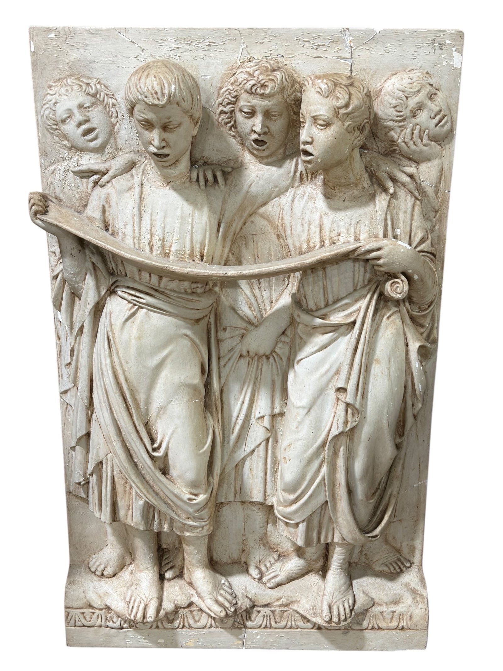 Classical Revival Figural Plaster Relief Panel of Youths Reading a Scroll: Large decorative Classical Revival-style relief panel depicting a group of five youthful figures in flowing robes gathered around an unfurled scroll, modeled in high relief with expressive faces, laye