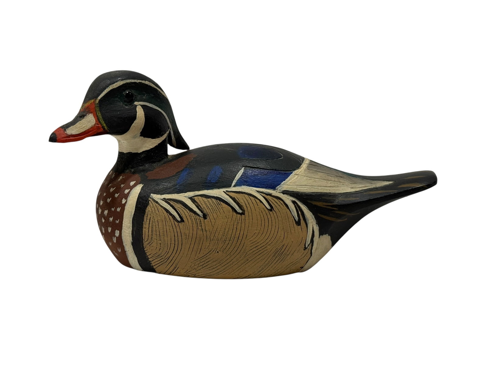 J.C. West, 1976, Hand-Carved & Painted Male Wood Duck Decoy: Hand-carved and painted wooden male wood duck decoy by J.C. West, modeled in a compact resting pose with inset glass eyes and richly detailed plumage. The drake is painted in deep black, green, blue, 