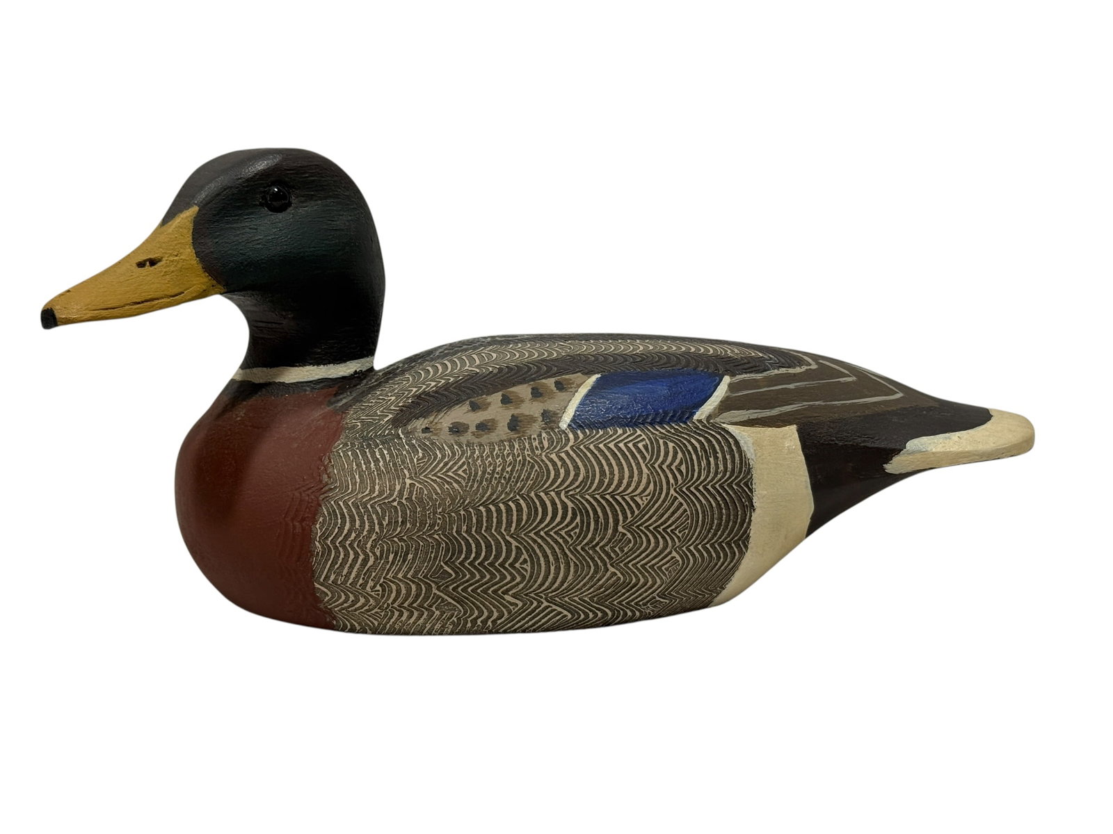 J.C. West, 1973, Hand-Carved & Painted Male Mallard Duck Decoy: Hand-carved and painted wooden male mallard duck decoy by J.C. West of Surf City, New Jersey, modeled in a classic resting form with inset glass eyes and finely detailed feather patterning throughout 