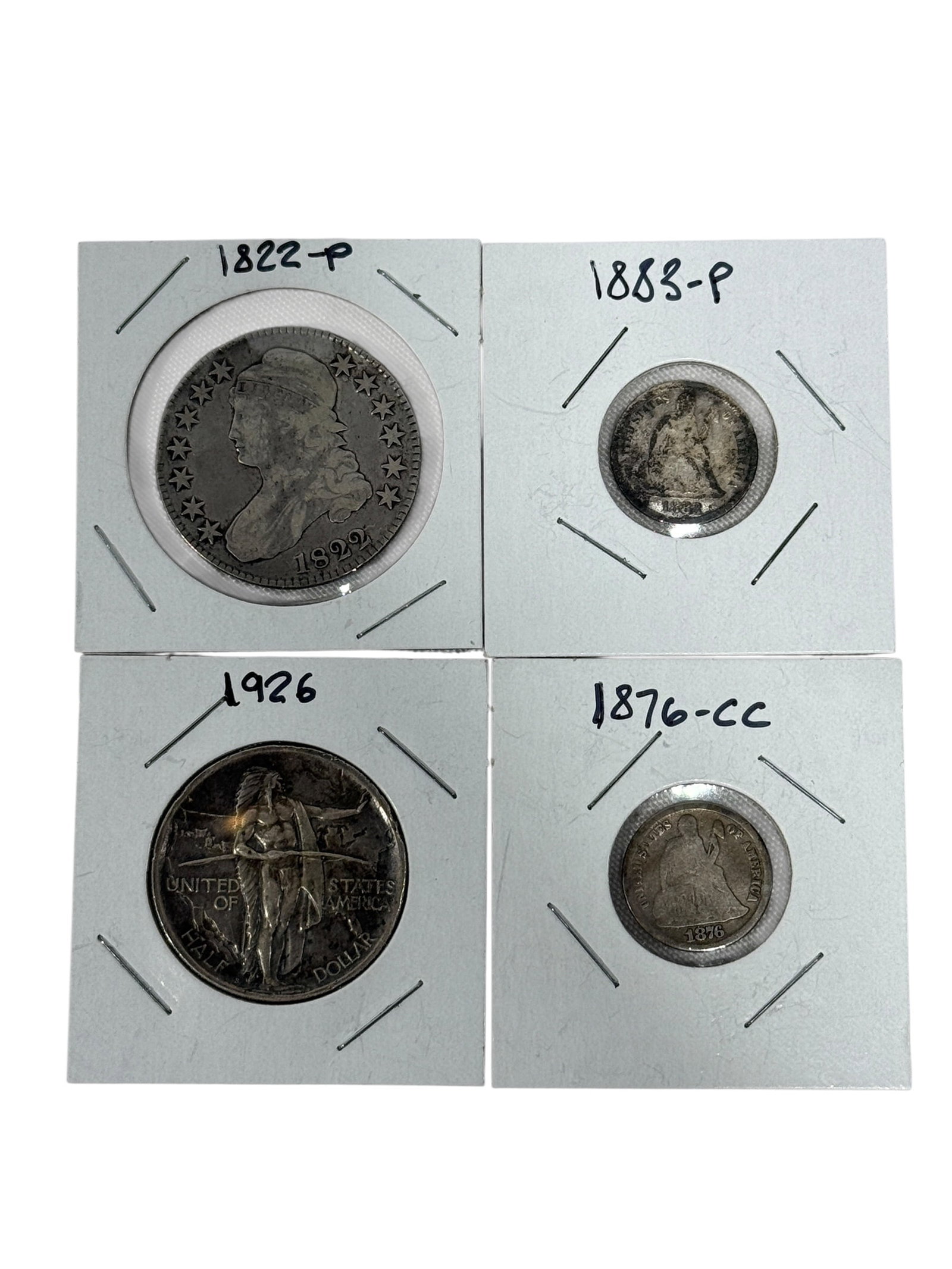 (4) 90% US Silver Coins: 1822 Capped Bust Half Dollar, 1876 Carson City Liberty Seated Dime, 1883 Seated Liberty Dime & 1926 Oregan Memorial Half Dollar.