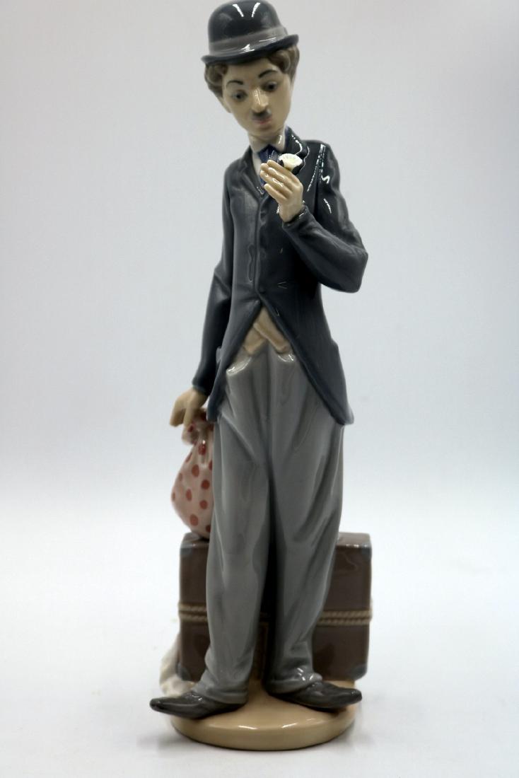 Lladro "Charlie the Tramp" #5233 Porcelain Figure: Lladro "Charlie the Tramp" #5233 Porcelain Figure. Measures - 11 1/4" High.