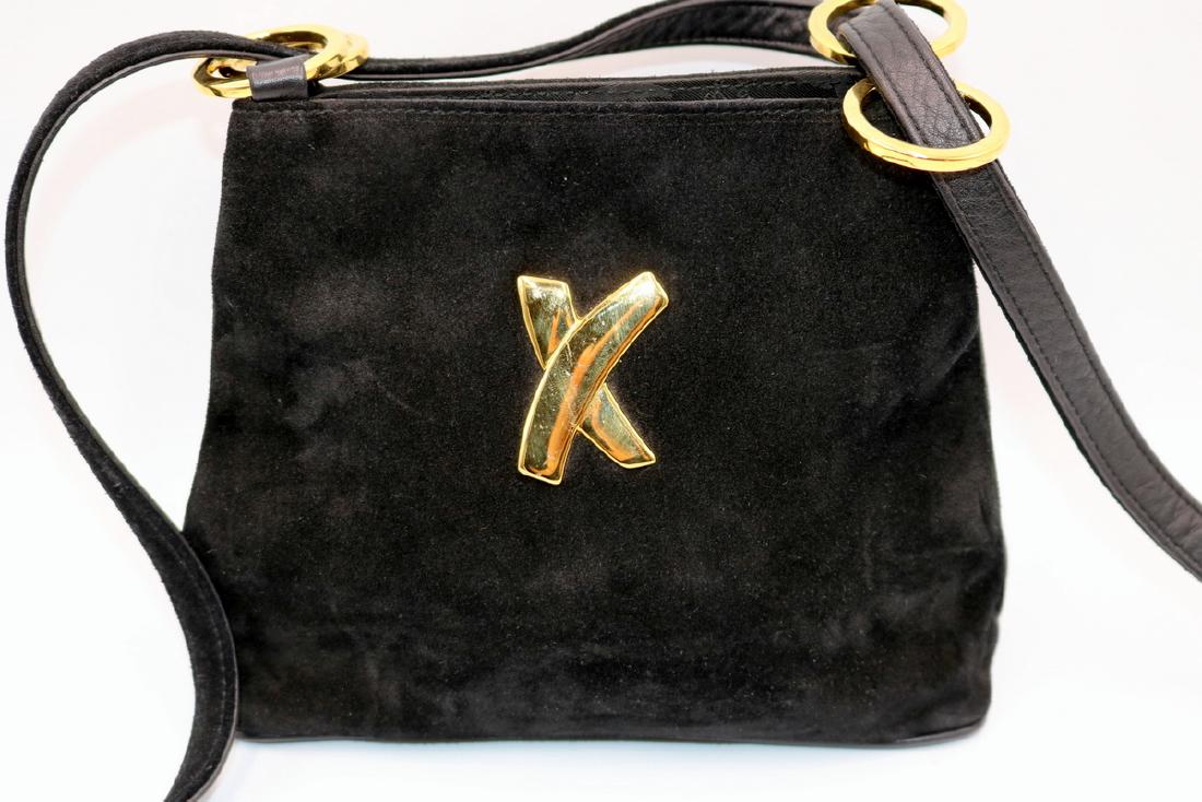 Paloma Picasso Suede X Black Purse: Paloma Picasso Suede X Black Purse. Measures - 9" wide x 6" high, 23 1/2" shoulder length. Paloma Picasso (born Anne Paloma Ruiz-Picasso y Gilot in Vallauris on 19 April 1949), is a French fashion des