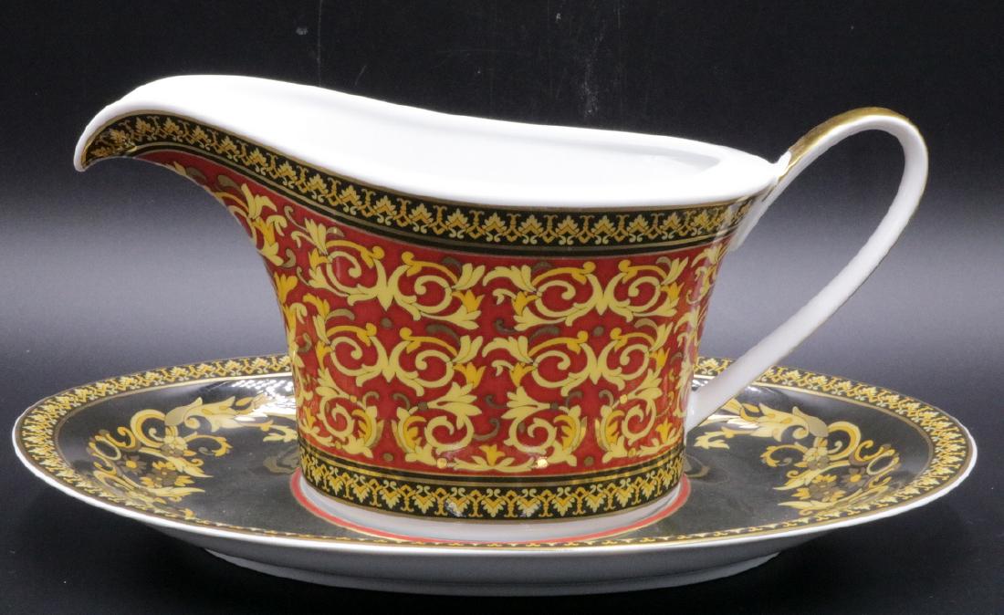 Rosenthal Versace "Medusa" Porcelain Sauce Boat: Rosenthal Versace "Medusa" Ikarus Red Porcelain Sauce Boat. Boat - 4 1/4" high x 8 5/8" long, underplate - 10" long. Retail - $595. Gianni Versace, representing luxurious & glamorous design. Versace m