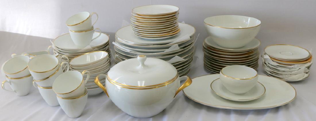 88 Pc. Johann Haviland Bavara Bone China Set: 88 Pc. Johann Haviland Bavara Bone China Set. With gold/gilt border. 12 dinner plates - 10 1/2", 12 salad plates - 7 5/8", 12 cream soup bowls - 7 1/2", 12 bread and butter plates - 6", 11 cups - 3" h