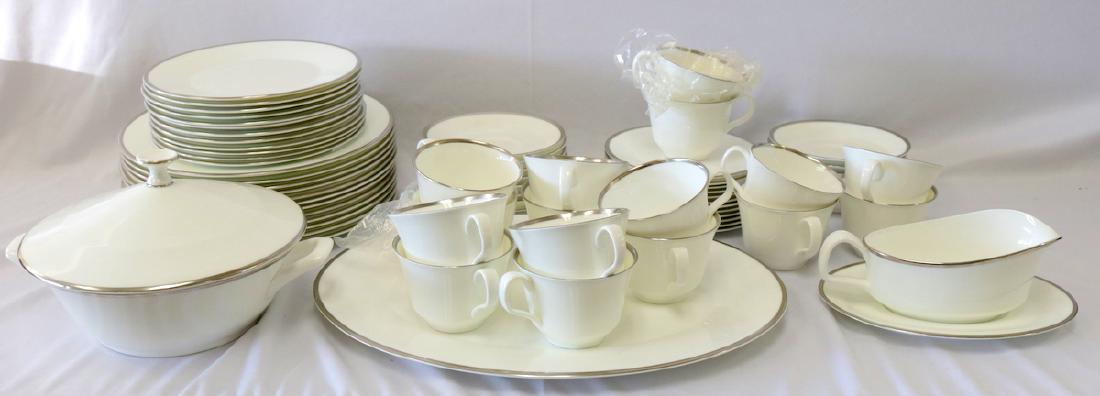 70 Pc. Minton "Palatine" Bone China Set: 70 Pc. Minton "Palatine" Bone China Set. 12 dinner plates - 10 1/2", 12 salad plates - 8 1/8", 12 bread and butter plates - 6 1/4", 15 saucers - 5 3/8", 16 cups - 2 3/4" high x 4 1/2" wide, 1 oval tra