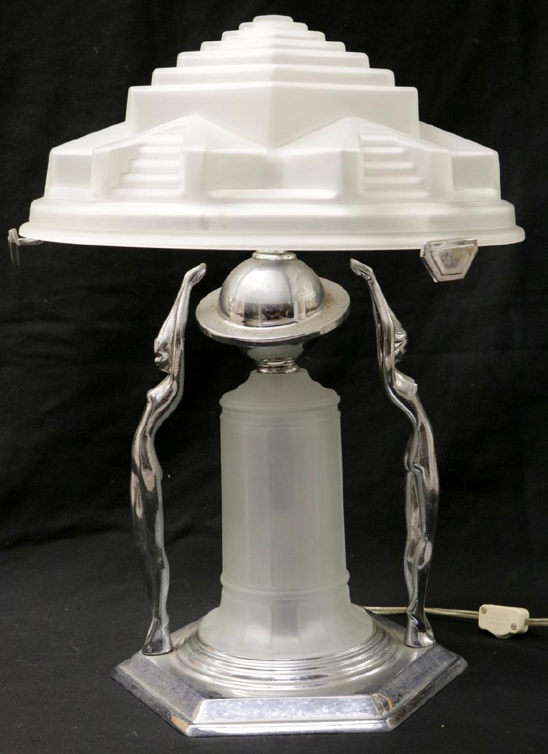 Possibly Frankart Art Deco Chrome & Frosted Glass Lamp: Possibly Frankart Art Deco Chrome & Frosted Glass Lamp. Two chrome nude women. Measures - 19" high x 14" wide. There are no marks.