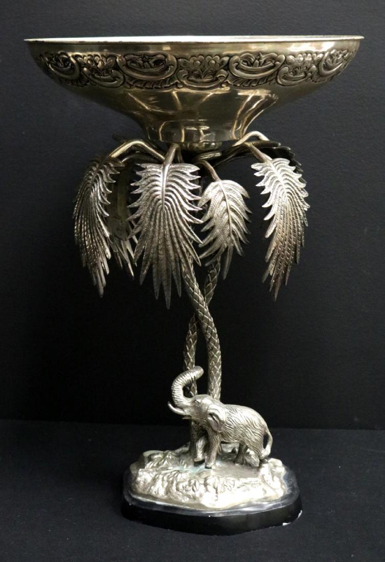 Rare Maitland Smith Silver Plated Elephant Footed: Rare Maitland Smith Silver Plated Elephant Footed Compote. Depicting a elephant under a palm tree. Measures - 19 1/2" high x 13 1/4" diameter.