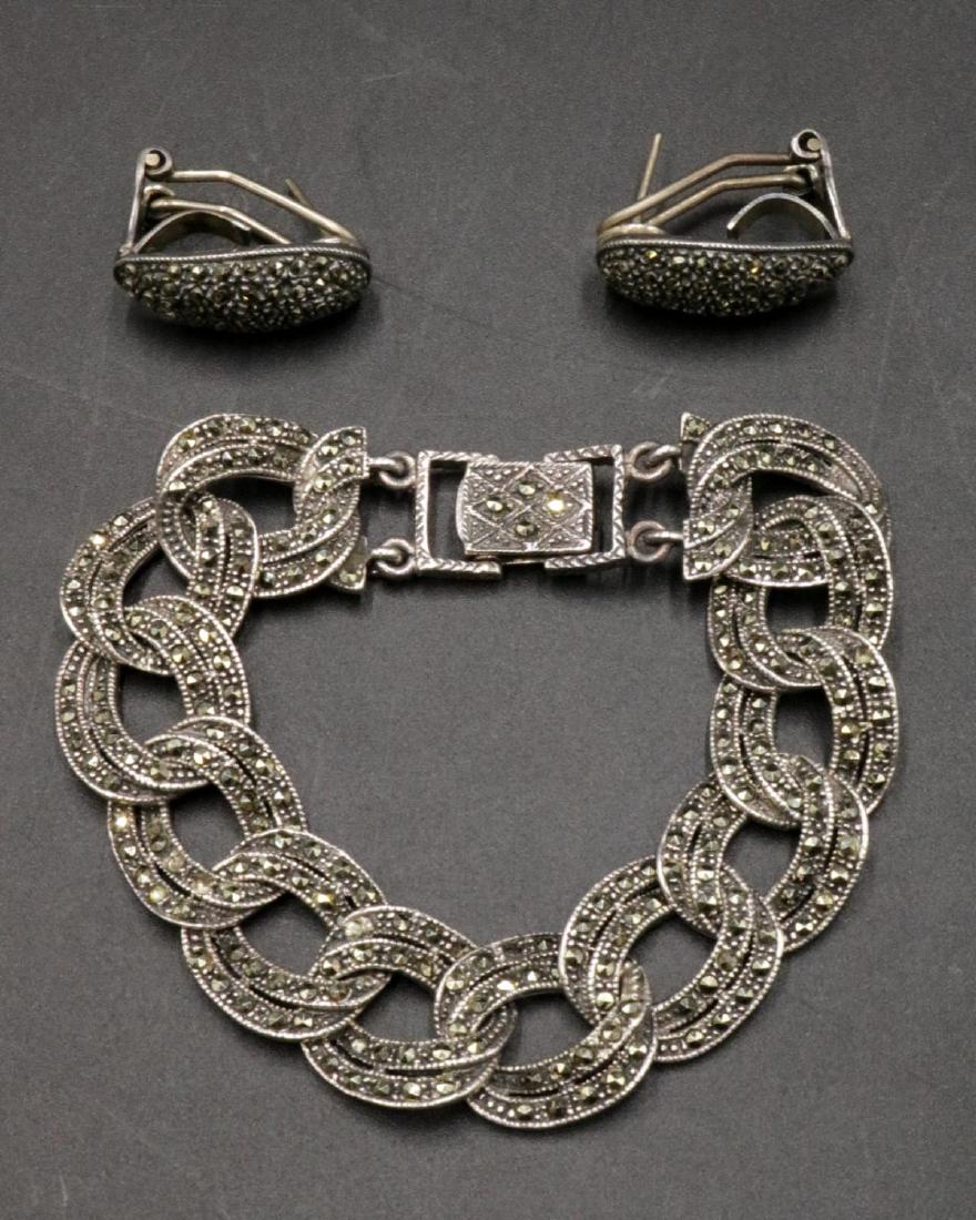 Sterling Marcasite Earrings & Bracelet Suite: Sterling Silver Marcasite Earrings & Bracelet Suite. Weight - 39.9 grams. Bracelet - 7" long.