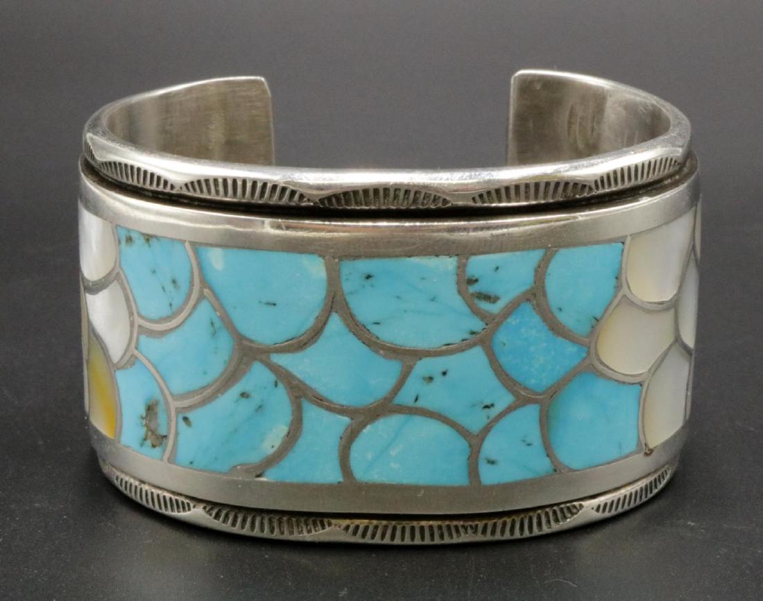 Native American Zuni Turquoise & MOP Sterling Cuff: Native American Zuni Turquoise & Mother of Pearl Sterling Cuff. Weight - 132.6 grams. Measures - 2 1/4" inside across.