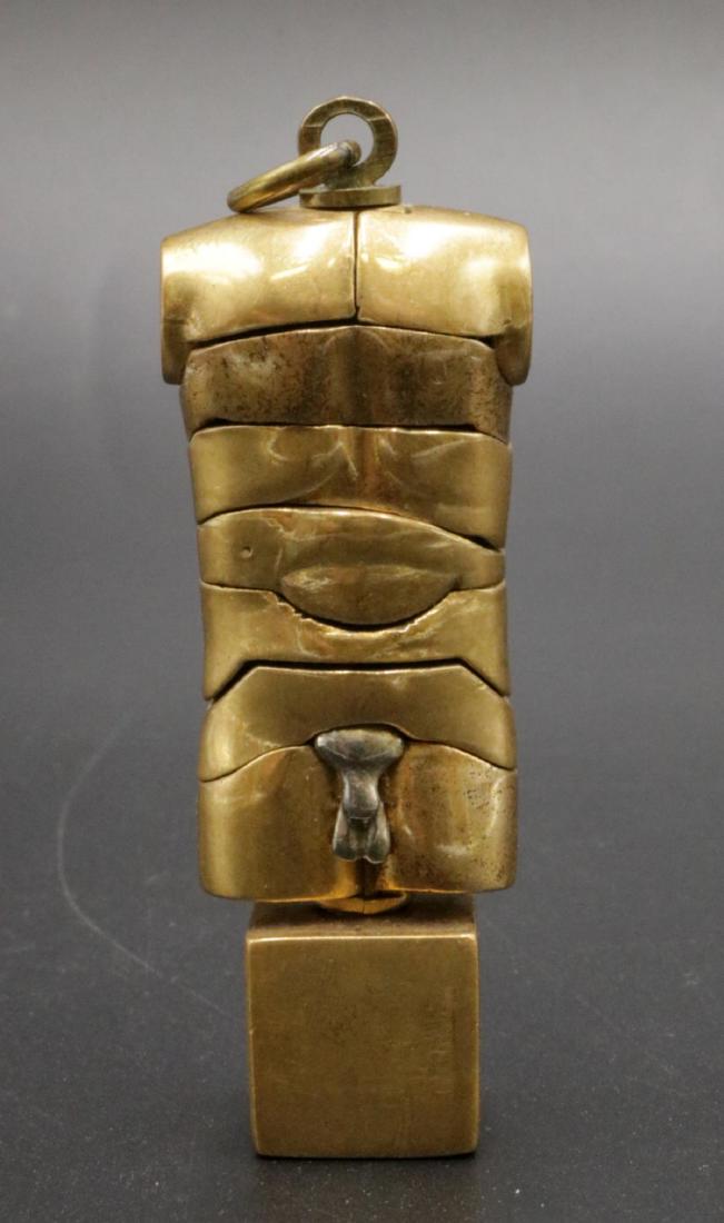 Miguel Berrocal "Micro David Puzzle" Bronze Pendant: Rare Miguel Berrocal "Micro David Puzzle" Nude Men's Torso Gold Plated Bronze Sculpture Pendant. Approx. measures - 2 3/8" high x 7/8" wide. Miguel Berrocal was an award-winning Spanish figurative and