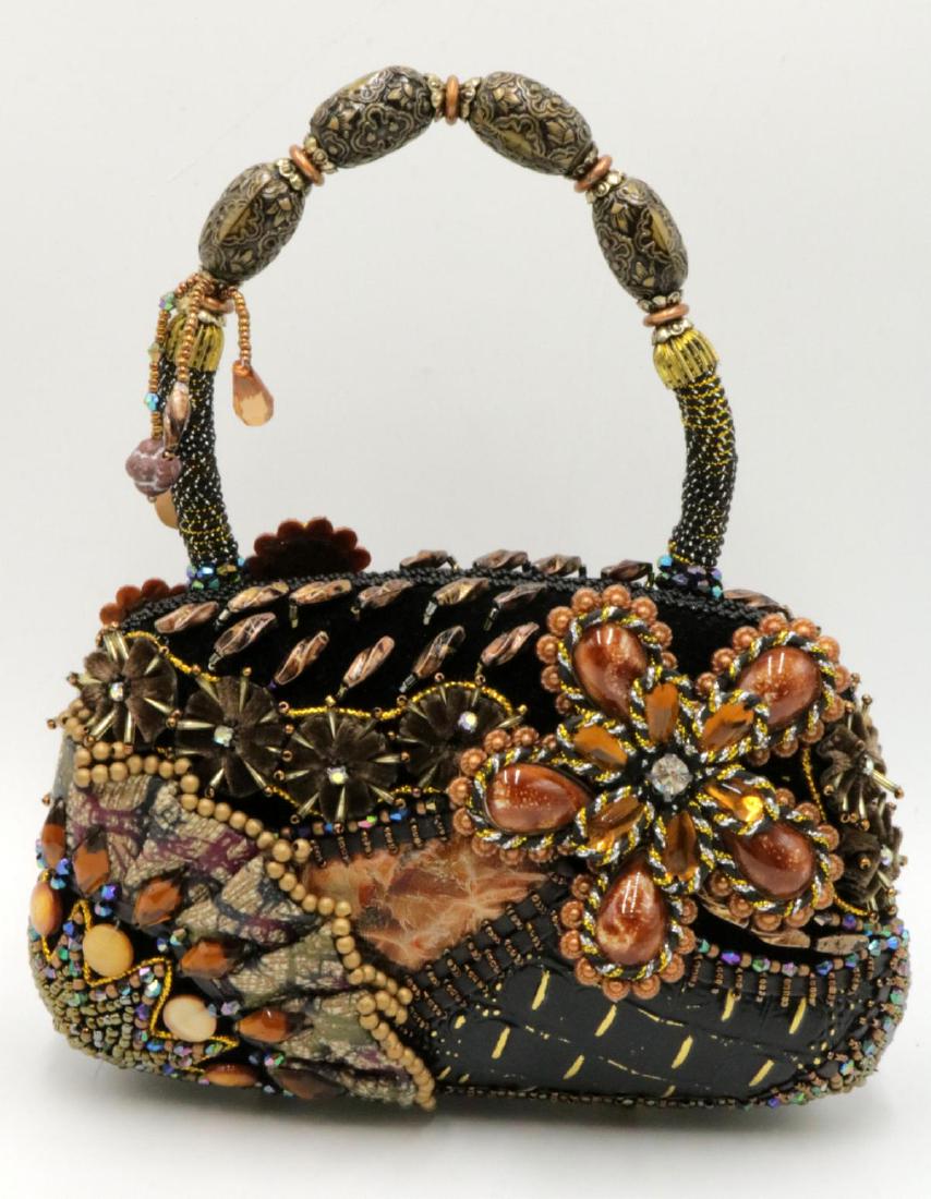 Moni Couture Multi-Colored Beaded Bag: Moni Couture Multi-Colored Beaded Bag. Measures - 7" wide x 4 1/2", measured without handle.