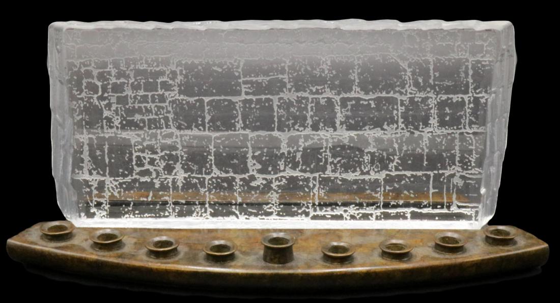 Steuben "Wailing Wall" Crystal & Bronze Menorah: Steuben "Wailing Wall" Frosted & Clear Crystal & Bronze 9- Light Menorah. Signed Steuben bottom right. Measures - 4 1/4" high x 9 3/4" long x 3 3/4" deep. Designed by Joel Smith. Condition - there is 