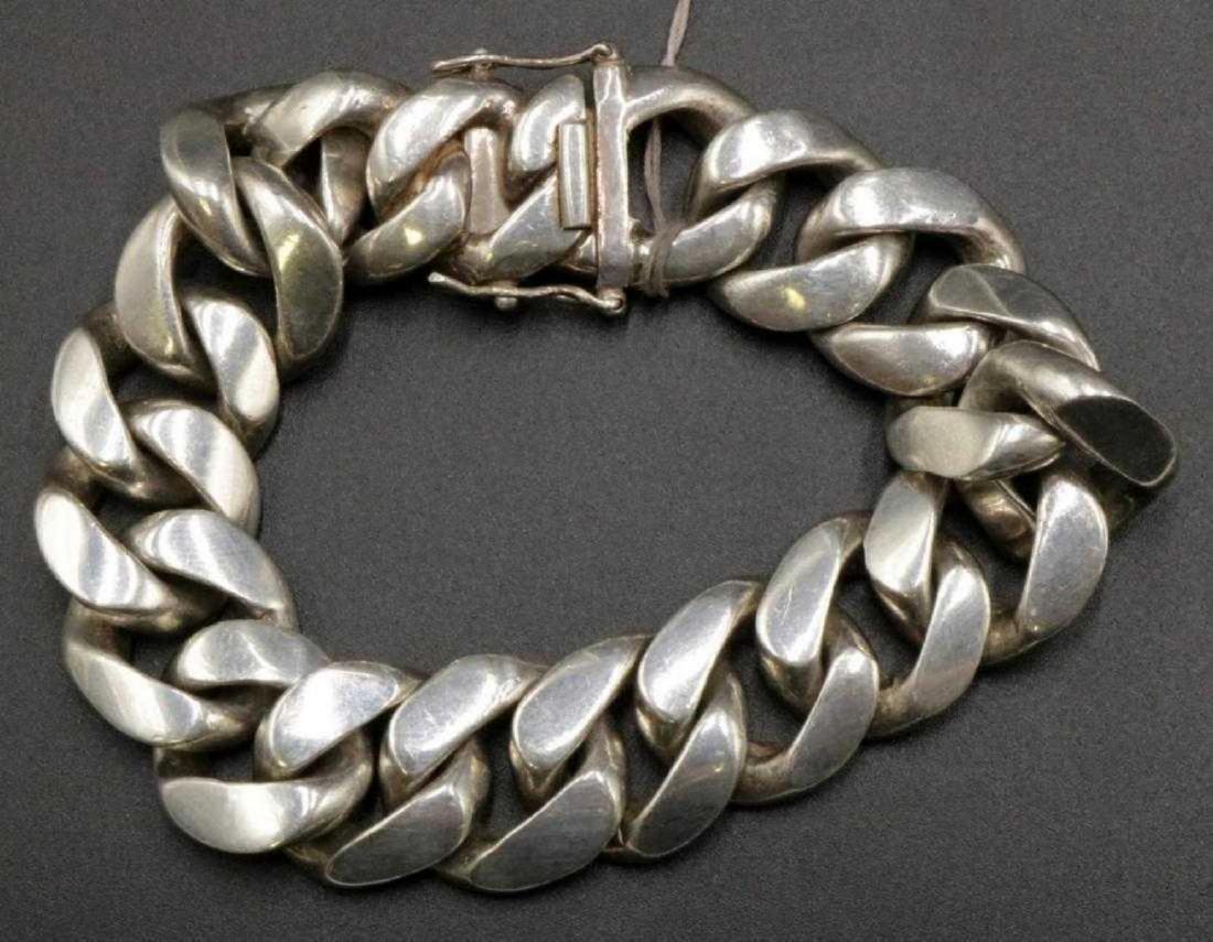 Zina of Beverly Hills Sterling Cuban Link Bracelet: Zina of Beverly Hills Sterling Silver Cuban Link Bracelet. Never worn. Measures - 8" long. Weight - 90 grams. With original tag of $500.