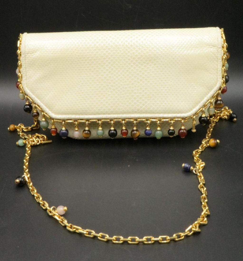 Judith Leiber Lizard & Semi-Precious Stone Evening Bag: Judith Leiber Lizard & Semi-Precious Stone Evening Bag. This bag is as is. Measures - 8 1/2" wide x 4 1/4" high.