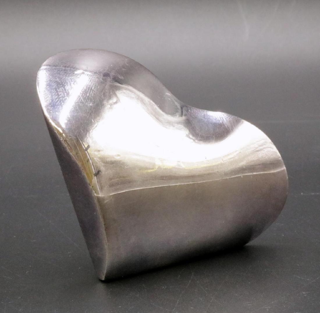 Heavy Christofle Silver Plated Paperweight: Heavy Christofle Silver Plated Paperweight. Measures - 2 1/2" high x 3" wide.