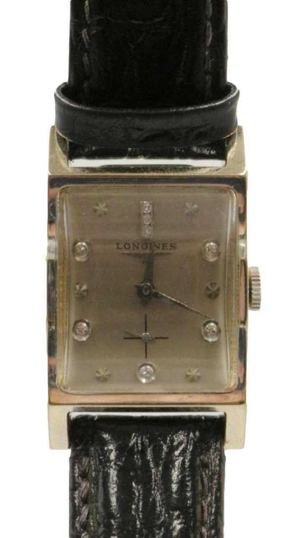 Rare Longines 14Kt Diamond Men's Watch: Rare Longines 14Kt White Gold Diamond Men's Watch. With black leather band. Measures - 8 1/2" long.