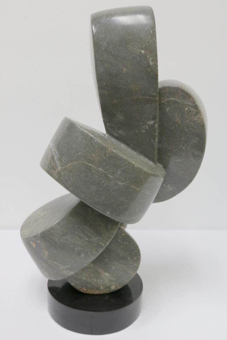 Large Signed Stone Modernist Sculpture: Large Signed Stone Modernist Sculpture. Measures - 24 1/4" high x 13 3/4" wide. Signed Rocker. On spinning base.