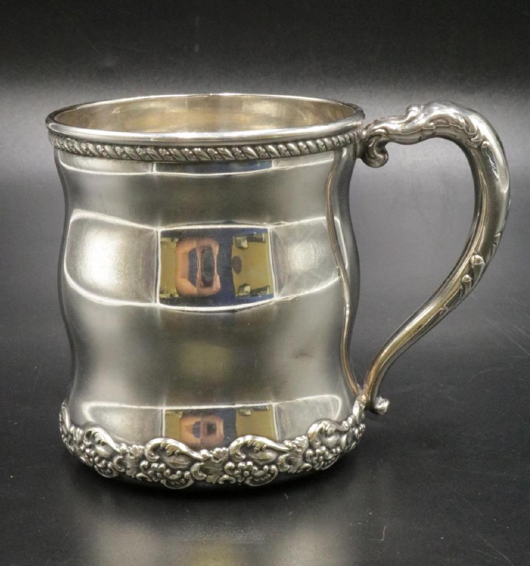 Waltrous Nickel Silver Handled Cup: Waltrous Nickel Silver Handled Cup. Weight - 131.5 grams. Measures - 3 3/8" high x 2 3/4" rim.