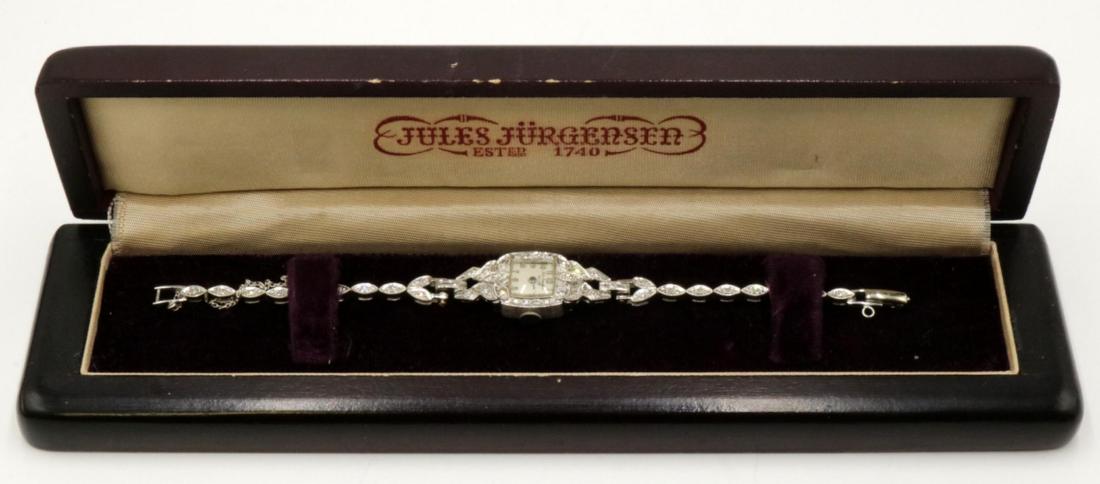 Art Deco Jules Jurgensen 14Kt & Diamond Watch: Art Deco Jules Jurgensen 14Kt White Gold & Diamond Watch. With original box and booklet. Measures - 6 1/4" long. Weight - 11.2 dwt.