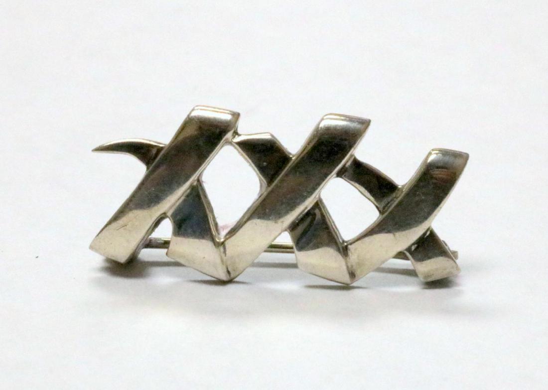 Tiffany & Co. Paloma Picasso Sterling Pin: Tiffany & Co. Paloma Picasso Sterling Silver "XXX" Pin. Measures - 1 1/8" long. Weight - 3.2 grams.