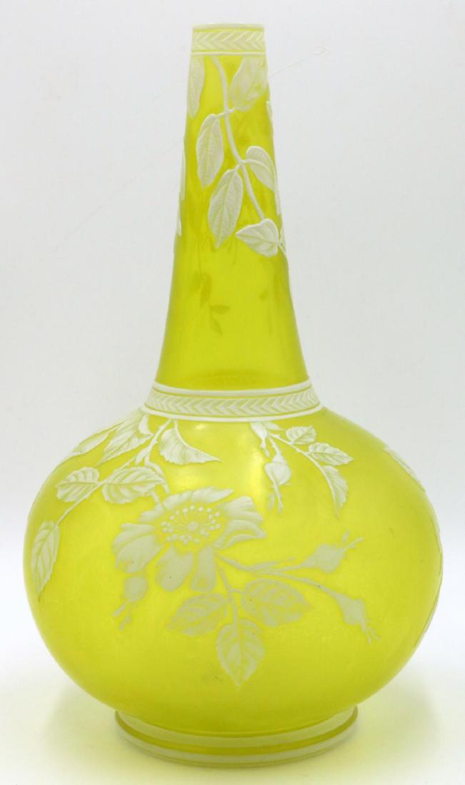 Thomas Webb Green Cameo Art Glass Vase: Large Thomas Webb Green Cameo Art Glass Vase. Depicting floral design throughout. Measures - 12" high x 7" diameter. Unsigned.