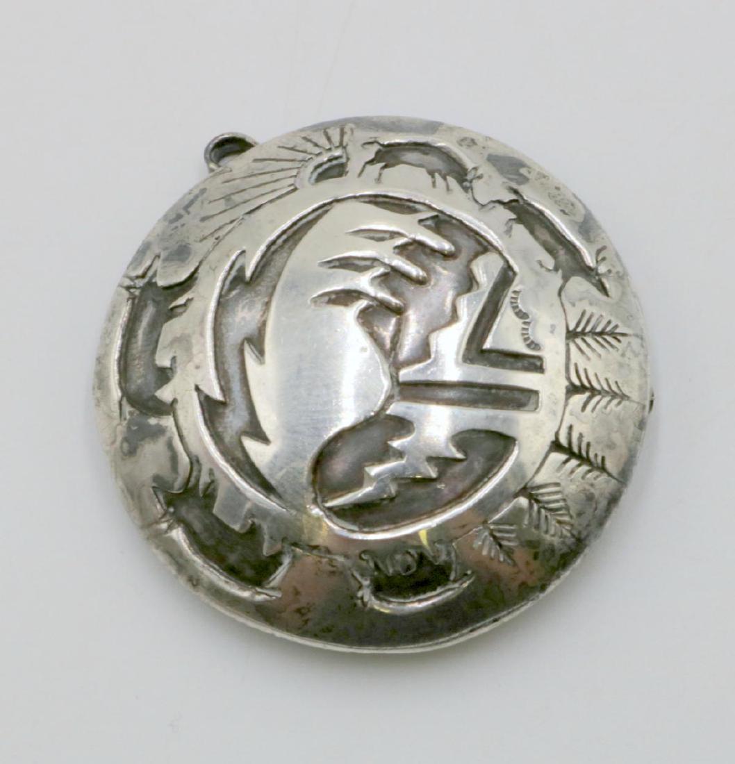 Native American Sterling Silver Brooch/Pendant: Native American Sterling Silver Brooch/Pendant. Measures - 1 3/4" diameter. Weight - 15.2 grams.