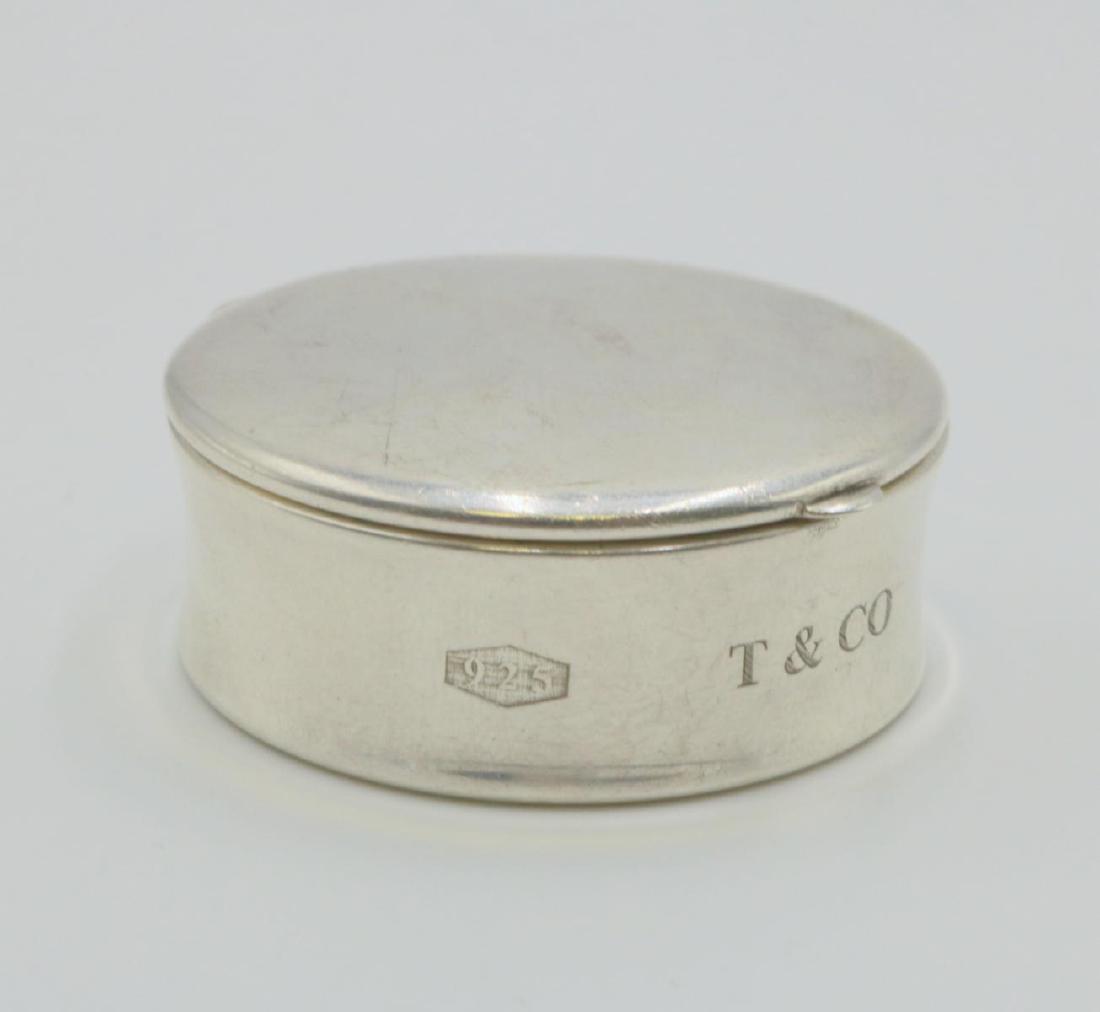 Tiffany & Co. Sterling Pill Box: Tiffany & Co. 2001 Sterling Silver Pill Box. Measures - 1 1/2" diameter. Weight - 22.3 grams.