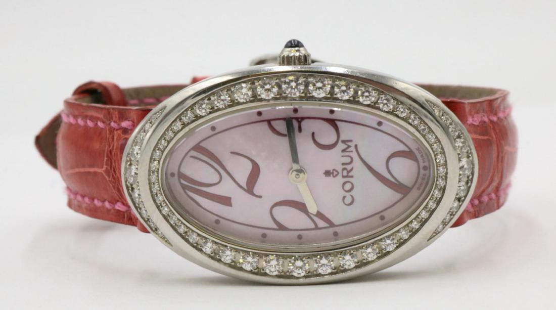Corum Ovale 2.50ct. Diamond & Stainless Steel Watch: Corum Ovale 2.50ct. Diamond & Stainless Steel Women's Watch, with original red corum leather band. Measures - 8 1/4" long. Model No.: 13741047.